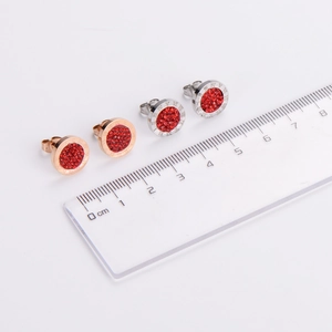 Retro Roman numeral stud earrings in rose gold and silver with red crystal inlay