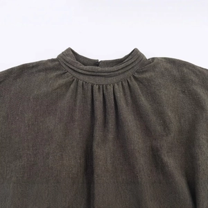 Deep grey mini dress featuring a pleated high neck and cotton-linen texture