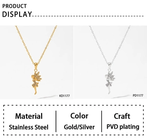 Comparison of gold and silver fairy wing necklaces in polished stainless steel