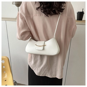 Rear view of a white crescent shoulder bag featuring a gold buckle and leather strap