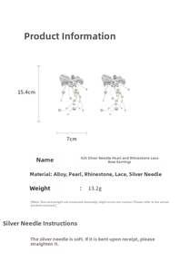 Detailed view of long lace bow earrings with pearls and rhinestones measuring 15.4cm
