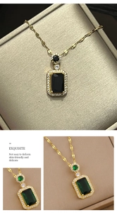 Detail of square emerald-cut gemstone pendants in gold plating with halo crystal accents