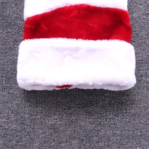 Detail of soft plush fabric texture on 1.3m Christmas hat with red and white fur material