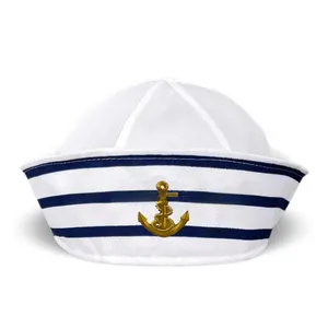 Close-up of white sailor cap with blue striped brim and gold anchor embroidery
