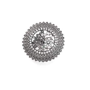 Retro ethnic style silver ring with hollow flower design and sparkling rhinestones