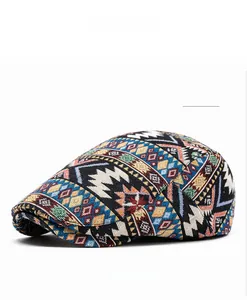 Close-up of vintage newsboy cap featuring blue ethnic geometric jacquard fabric pattern