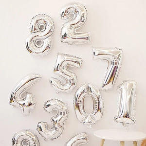 Collection of silver 16-inch aluminum foil number balloons for birthday party decoration