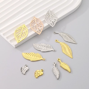 Gold and silver hollow leaf pendants in various styles for jewelry making and bracelets