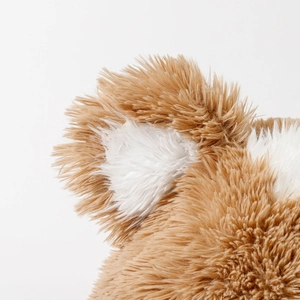 Close-up of soft plush bear ears in khaki and white featuring high-quality faux fur texture