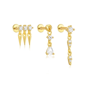 Vue détaillée de trois boucles d'oreilles en argent S925 doré avec zircons blancs brillants