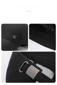 Détail d'un emblème métallique sur une casquette noire avec boucle réglable et maille