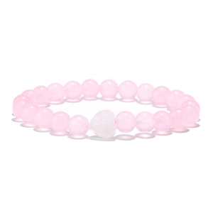 Detail of pink crystal beaded bracelet featuring a smooth heart-shaped center bead