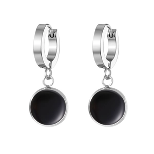 Detail view of silver stainless steel hoop earrings with glossy black round disc charms
