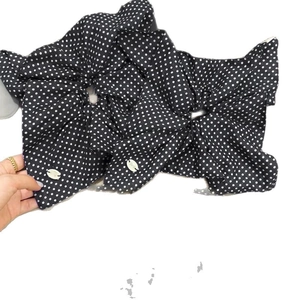 Black polka dot fabric scrunchies with elegant silver metal oval buckle detail