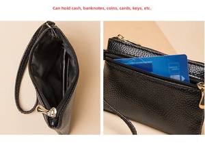 Internal view of double-layer black lychee leather mini wallet with gold zippers