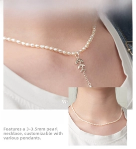 Detail showing 3-3.5mm mini freshwater pearls with a delicate silver leaf pendant