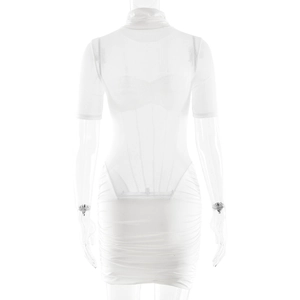 Back view of white bodycon dress with sheer mesh top and ruched mini skirt design