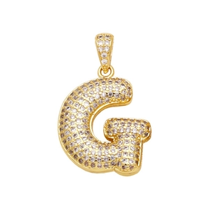 Detail of gold letter G pendant with micro-pave white cubic zirconia and 3D design