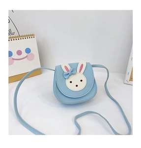 Close-up of light blue mini crossbody bag with cute white bunny patch for girls
