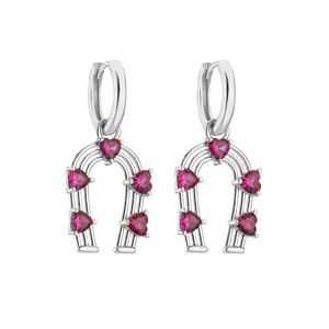 Detail view of horseshoe earrings with heart-shaped pink zircon and silver plating