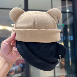 Japanese style cat ear brimless docker hat in khaki and black with metal ring detail