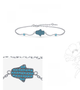 Detail of S925 silver Hamsa hand bracelet with turquoise stone and extension chain
