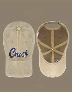 Detailed view of washed cotton baseball cap with Crush 3D embroidery and metal buckle