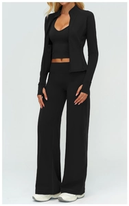 Three-piece black yoga set featuring a zip jacket with thumbholes and wide leg pants