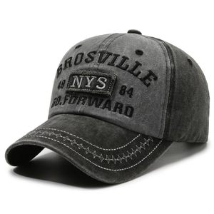 Vintage washed denim baseball cap with 3D embroidery and star stitching detail on brim