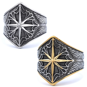 Close-up of vintage Nordic Viking compass rings in antique silver and gold finishes