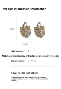 Macro shot of 2.6cm geometric C-shaped earrings with 925 silver needles and cubic zirconia