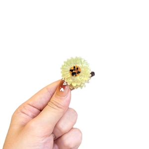 Mini acrylic yellow sunflower hair clip with tortoise shell center pattern