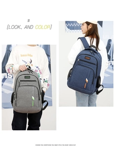 Detailed comparison of gray and blue business backpacks featuring dual storage compartments