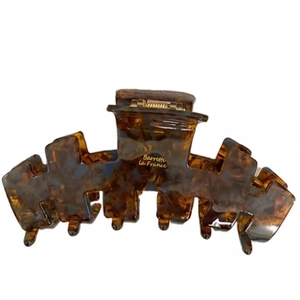 Classic tortoise shell hair claw clip featuring Barrette La France gold lettering for women
