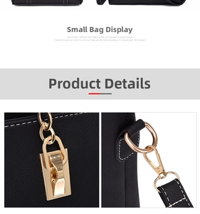 Detail of black litchi grain leather bag with gold hardware and white contrast stitching