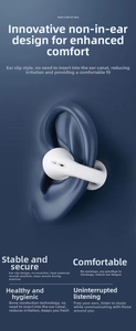 Detail showing white open-ear clip-on headphones worn on the ear for secure fit