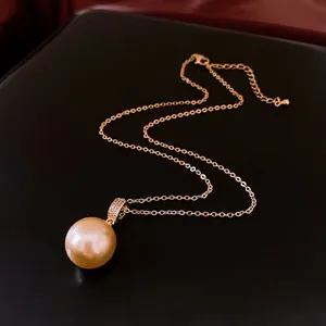 Collier plaqué or 18 carats avec pendentif grande perle champagne et oxydes de zirconium