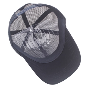 Detail view of the breathable mesh back and adjustable snapback closure on the trucker cap