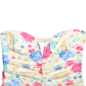 Detail of floral bustier top with sweetheart neckline and ruched fabric texture