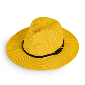 Detail of a ginger yellow straw sun hat featuring a black leather band and silver buckle