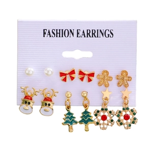 Detail view of a 6-pair Christmas earring set with snowman reindeer and tree charms