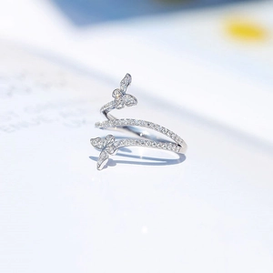 Elegant silver butterfly spiral ring with small diamond accents for women's fashion