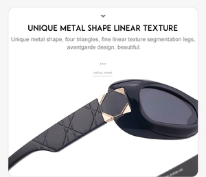 Detail of black sunglasses with unique metal shape and linear texture on temples
