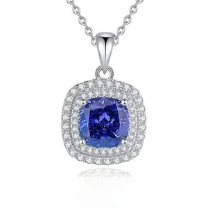 Macro detail of S925 silver pendant featuring a blue cushion-cut stone and zircon halo