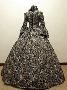 Detailed back view of a Victorian style party dress with lace-up corset and floral patterns