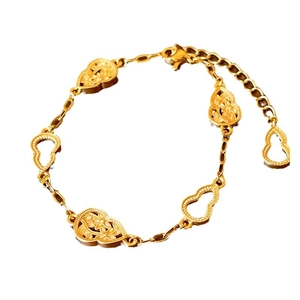 Vergoldetes Armband mit hohlen Blumen-Gourd-Anhängern und verstellbarem Karabinerverschluss