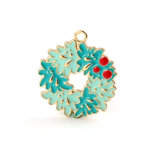Detailed view of colorful enamel Christmas wreath pendant with gold alloy metal base