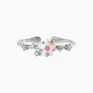 Macro shot of silver adjustable ring with holographic star and small zircon accents