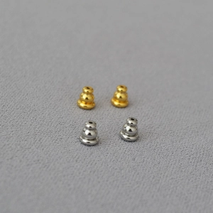 Brass gold-plated silicone non-slip bullet earring backs in gold and silver set