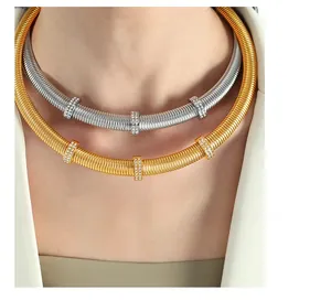Detail of double-layer Tubogas snake chain necklace with sparkling rhinestone spacers